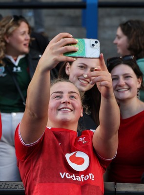 180426 - Wales v France, Guinness Women’s 6 Nations - Molly Reardon of Wales with supporters at the end of the match 