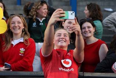 180426 - Wales v France, Guinness Women’s 6 Nations - Molly Reardon of Wales with supporters at the end of the match 