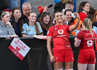 180426 - Wales v France, Guinness Women’s 6 Nations - Bryonie King of Wales and Seren Lockwood of Wales with supporters at the end of the match 