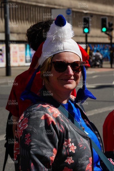 180426 - Wales v France - Guinness Women's Six Nations - Fans of France pose for a photograph outside the stadium prior to the match