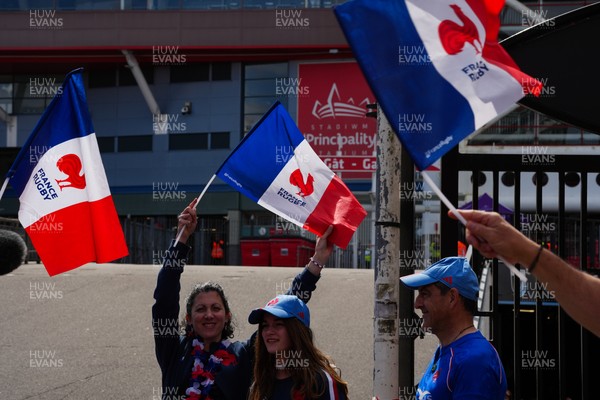 180426 - Wales v France - Guinness Women's Six Nations - Fans of France pose for a photograph outside the stadium prior to the match