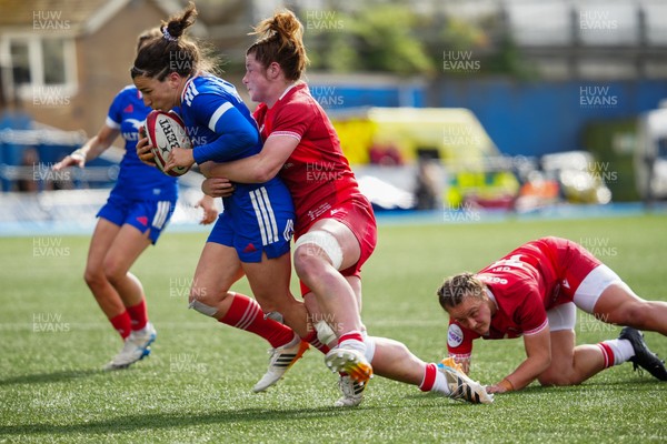 180426 - Wales v France - Guinness Women's Six Nations - Gabrielle Vernier of France is tackled by Kate Williams of Wales