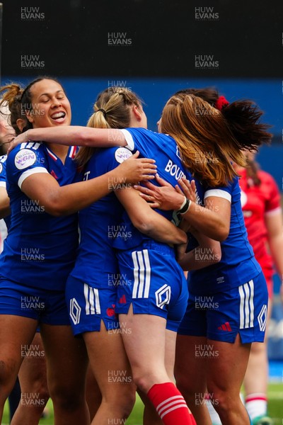 180426 - Wales v France - Guinness Women's Six Nations - Pauline Bourdon Sansus of France celebrates scoring her team’s fourth try with teammates