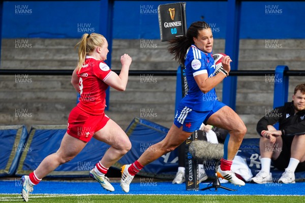 180426 - Wales v France - Guinness Women's Six Nations - Lea Murie of France runs with the ball whilst under pressure from Seren Lockwood of Wales