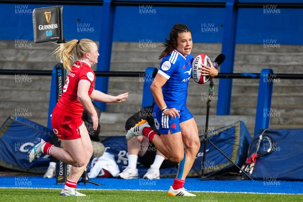 180426 - Wales v France - Guinness Women's Six Nations - Annaelle Deshayes of France runs with the ball whilst under pressure from Seren Lockwood of Wales