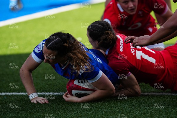 180426 - Wales v France - Guinness Women's Six Nations - Anais Grando of France scores her team’s sixth try whilst under pressure from Jasmine Joyce-Butchers of Wales
