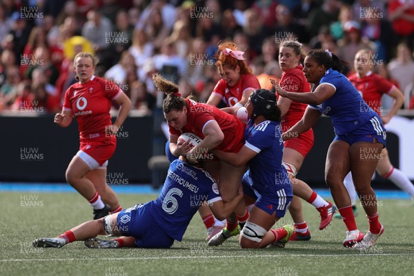 180426 - Wales v France, Guinness Women’s 6 Nations - Gwenllian Pyrs of Wales takes on Axelle Berthoumieu of France