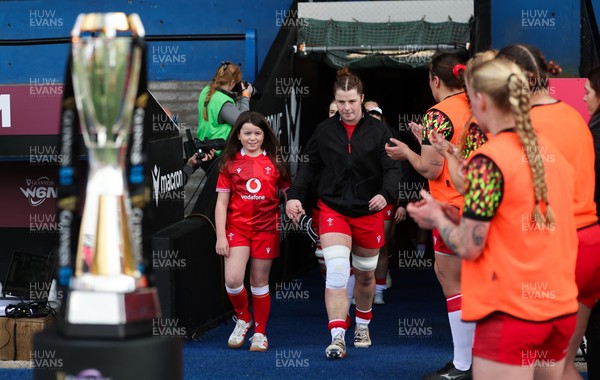 180426 - Wales v France, Guinness Women’s 6 Nations - Wales captain Kate Williams walks out and lines up for the anthem with the match mascot