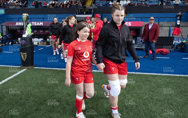 180426 - Wales v France, Guinness Women’s 6 Nations - Wales captain Kate Williams walks out and lines up for the anthem with the match mascot