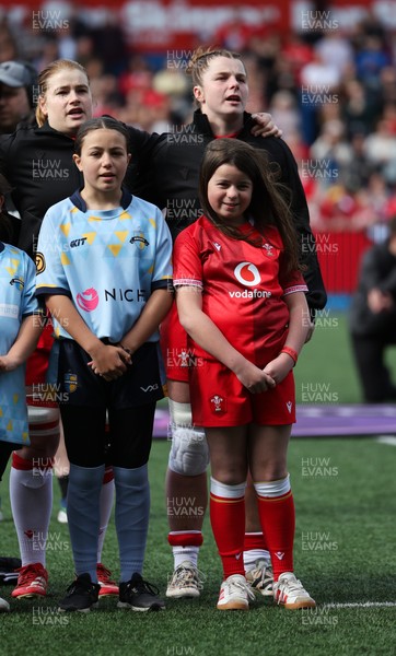 180426 - Wales v France, Guinness Women’s 6 Nations - Wales captain Kate Williams walks out and lines up for the anthem with the match mascot