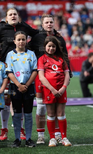 180426 - Wales v France, Guinness Women’s 6 Nations - Wales captain Kate Williams walks out and lines up for the anthem with the match mascot