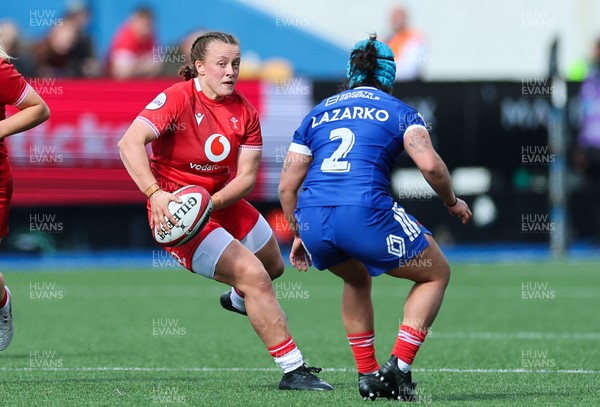 180426 - Wales v France, Guinness Women’s 6 Nations - Lleucu George of Wales takes on Mathilde Lazarko of France 