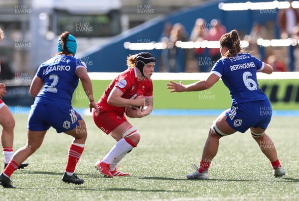 180426 - Wales v France, Guinness Women’s 6 Nations - Bethan Lewis of Wales takes on Axelle Berthoumieu of France 