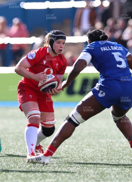 180426 - Wales v France, Guinness Women’s 6 Nations - Bethan Lewis of Wales takes on Madoussou Fall Raclot of France 