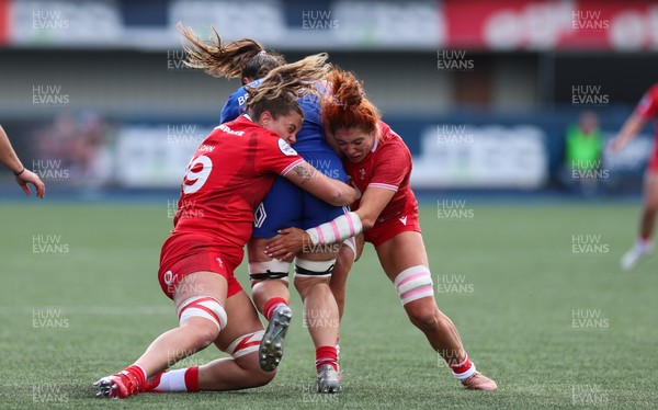 180426 - Wales v France, Guinness Women’s 6 Nations - Natalia John of Wales and Georgia Evans of Wales tackle Axelle Berthoumieu of France 