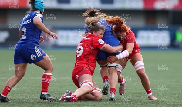 180426 - Wales v France, Guinness Women’s 6 Nations - Natalia John of Wales and Georgia Evans of Wales tackle Axelle Berthoumieu of France 