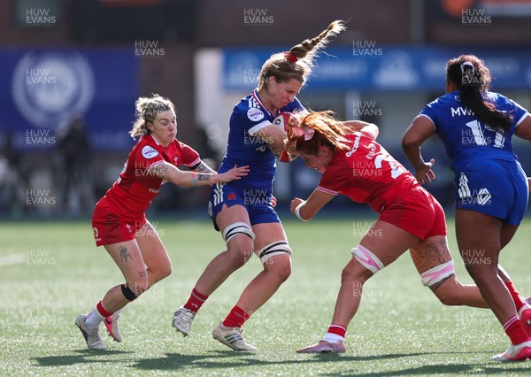 180426 - Wales v France, Guinness Women’s 6 Nations - Lea Champon of France is tackled by Keira Bevan of Wales and Georgia Evans of Wales