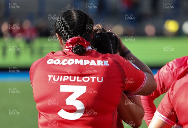 180426 - Wales v France, Guinness Women’s 6 Nations - Sisilia Tuipulotu of Wales with Courtney Keight of Wales at the end of the match
