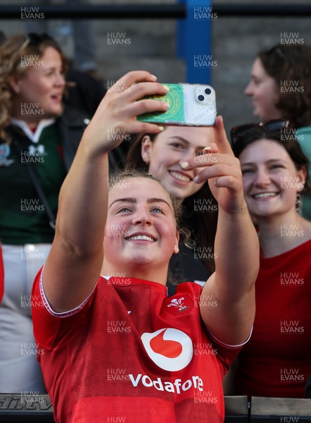 180426 - Wales v France, Guinness Women’s 6 Nations - Molly Reardon of Wales with supporters at the end of the match 