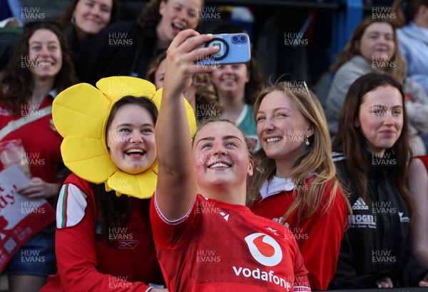 180426 - Wales v France, Guinness Women’s 6 Nations - Molly Reardon of Wales with supporters at the end of the match 