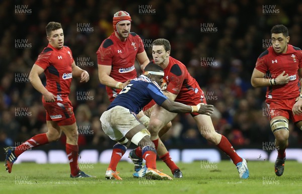 210214 - Wales v France, RBS Six Nations 2014 - George North of Wales takes on Yannick Nyanga of France 