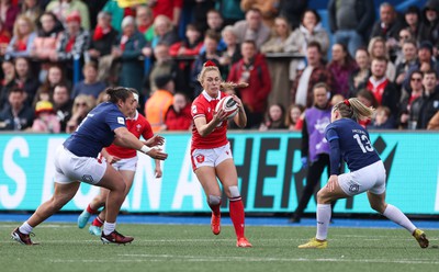 210424 - Wales v France, Guinness Women’s 6 Nations - Hannah Jones of Wales looks to break away