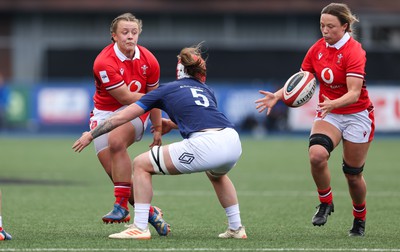 210424 - Wales v France, Guinness Women’s 6 Nations - Lleucu George of Wales links with Alisha Butchers of Wales to set up an attack