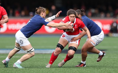 210424 - Wales v France, Guinness Women’s 6 Nations - Gwennan Hopkins of Wales charges at the French defence