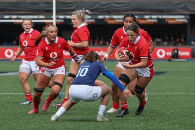 210424 - Wales v France, Guinness Women’s 6 Nations - Alisha Butchers of Wales takes on Lina Queyroi of France