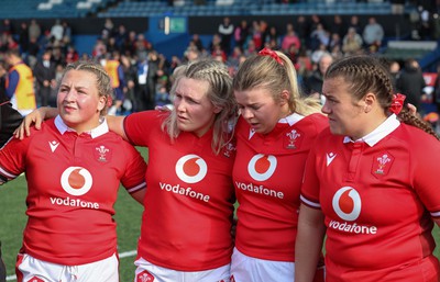 210424 - Wales v France, Guinness Women’s 6 Nations - Molly Reardon of Wales, Alex Callender of Wales, Mollie Wilkinson of Wales and Carys Phillips of Wales at the end of the match