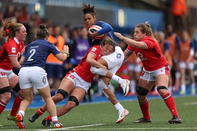 210424 - Wales v France, Guinness Women’s 6 Nations - Anne-Cecile Ciofani of France is tackled by Alisha Butchers of Wales and Natalia John of Wales