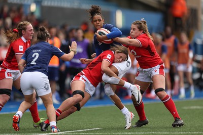 210424 - Wales v France, Guinness Women’s 6 Nations - Anne-Cecile Ciofani of France is tackled by Alisha Butchers of Wales and Natalia John of Wales