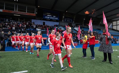 210424 - Wales v France, Guinness Women’s 6 Nations - Hannah Jones of Wales leads her team out to line up for the anthems