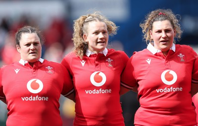 210424 - Wales v France, Guinness Women’s 6 Nations - Abbey Constable of Wales, Carys Cox of Wales and Gwenllian Pyrs of Wales line up for the anthems