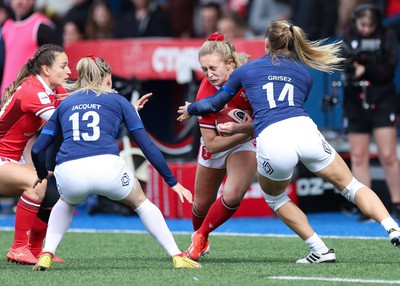 210424 - Wales v France, Guinness Women’s 6 Nations - Hannah Jones of Wales takes on Joanna Grisez of France