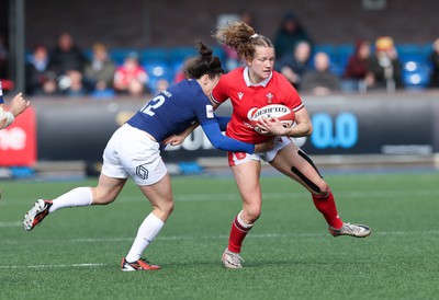 210424 - Wales v France, Guinness Women’s 6 Nations -Carys Cox of Wales takes on Gabrielle Vernier of France