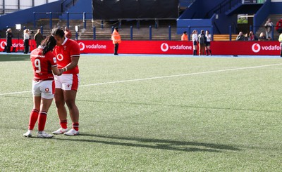 210424 - Wales v France, Guinness Women’s 6 Nations - Sian Jones of Wales and Sisilia Tuipulotu of Wales embrace each other at the end of the match