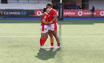 210424 - Wales v France, Guinness Women’s 6 Nations - Sian Jones of Wales and Sisilia Tuipulotu of Wales embrace each other at the end of the match