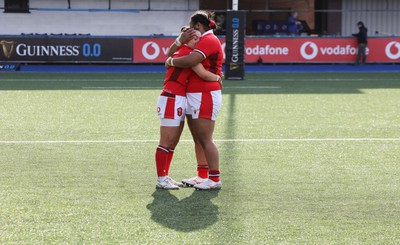 210424 - Wales v France, Guinness Women’s 6 Nations - Sian Jones of Wales and Sisilia Tuipulotu of Wales embrace each other at the end of the match