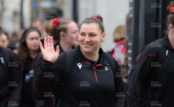 210424 - Wales v France, Guinness Women’s 6 Nations -  Gwenllian Pyrs of Wales waves as the Wales team walk from the hotel to the ground ahead of the match