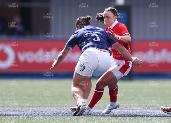 210424 - Wales v France, Guinness Women’s 6 Nations - Sian Jones of Wales takes on Assia Khalfaoui of France