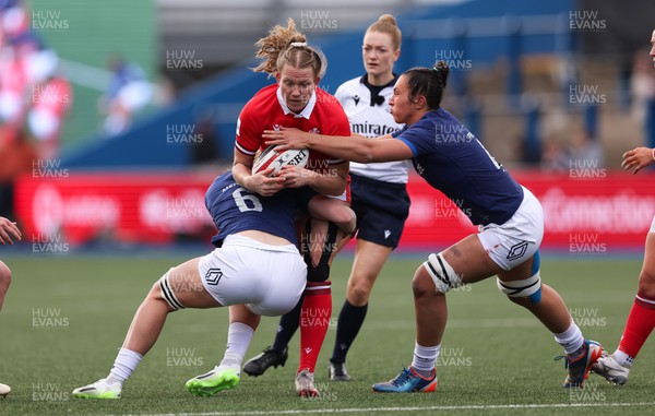 210424 - Wales v France, Guinness Women’s 6 Nations - Carys Cox of Wales takes on Romane Menager of France