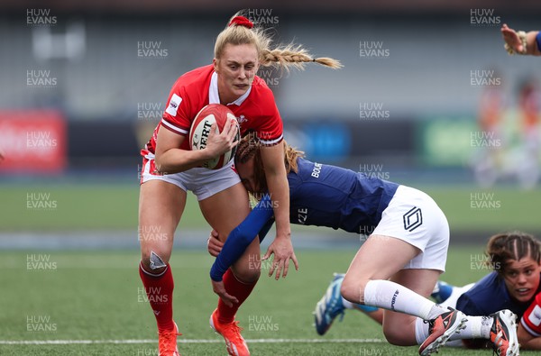 210424 - Wales v France, Guinness Women’s 6 Nations - Hannah Jones of Wales looks to break away