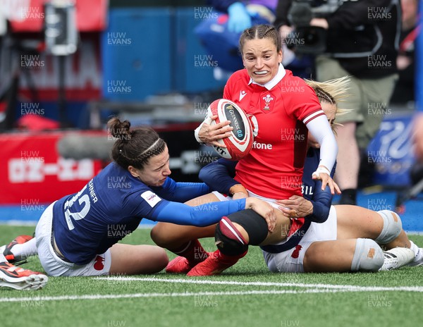 210424 - Wales v France, Guinness Women’s 6 Nations - Jasmine Joyce of Wales is tackled