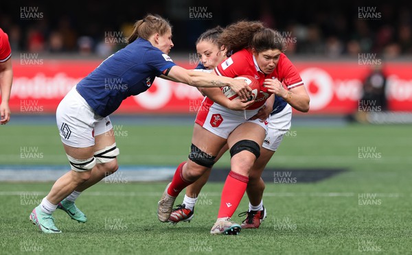 210424 - Wales v France, Guinness Women’s 6 Nations - Gwennan Hopkins of Wales charges at the French defence