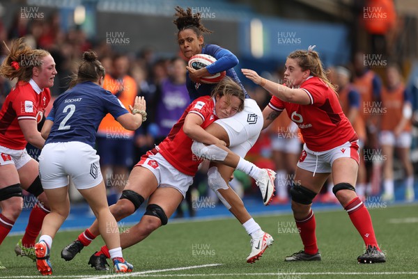 210424 - Wales v France, Guinness Women’s 6 Nations - Anne-Cecile Ciofani of France is tackled by Alisha Butchers of Wales and Natalia John of Wales