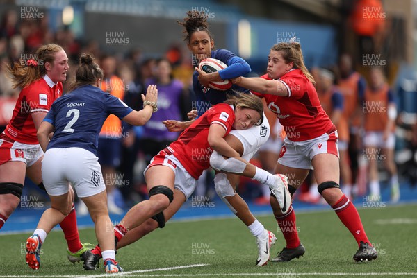 210424 - Wales v France, Guinness Women’s 6 Nations - Anne-Cecile Ciofani of France is tackled by Alisha Butchers of Wales and Natalia John of Wales