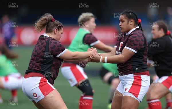 210424 - Wales v France, Guinness Women’s 6 Nations - Gwenllian Pyrs of Wales and Sisilia Tuipulotu of Wales during warm up