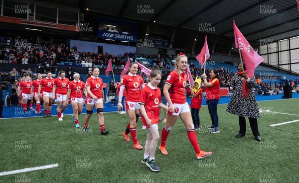 210424 - Wales v France, Guinness Women’s 6 Nations - Hannah Jones of Wales leads her team out to line up for the anthems
