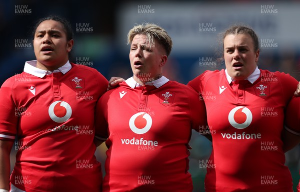 210424 - Wales v France, Guinness Women’s 6 Nations - Sisilia Tuipulotu of Wales, Donna Rose of Wales and Carys Phillips of Wales line up for the anthems